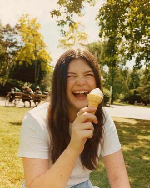 Participant engaging joyfully in a real community setting